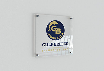 Gulf Breeze Insurance, Inc. logo printed on a glass frame